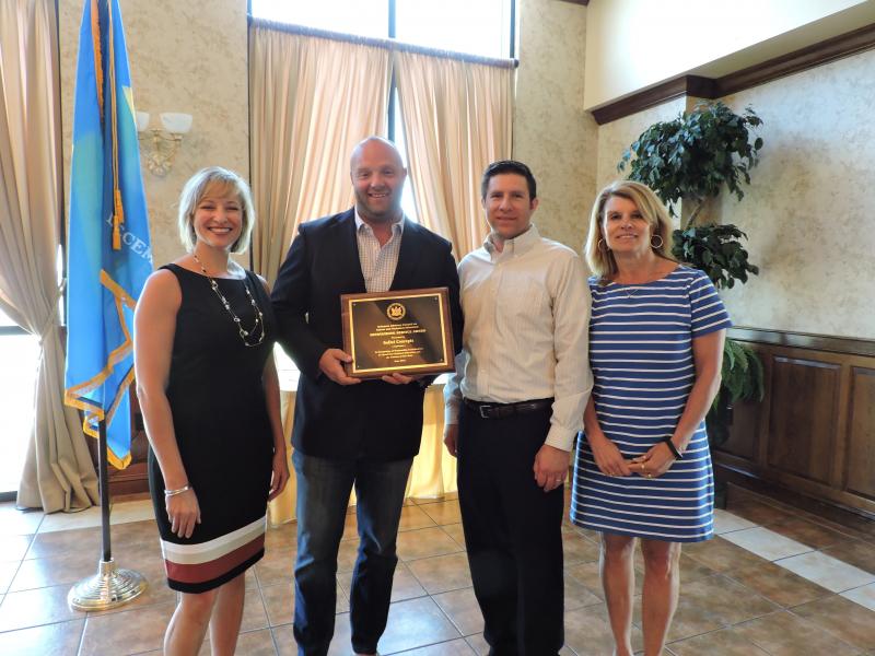 SoDel Concepts recently received the Outstanding Service Award from the Delaware Advisory Council on Career and Technical Education. Shown are (l-r) Danielle Panarello and Jim Affeldt of SoDel Concepts; and Joe Hallman, culinary arts teacher, and Terry Carson, principal, both of Seaford High School. SUBMITTED PHOTO
